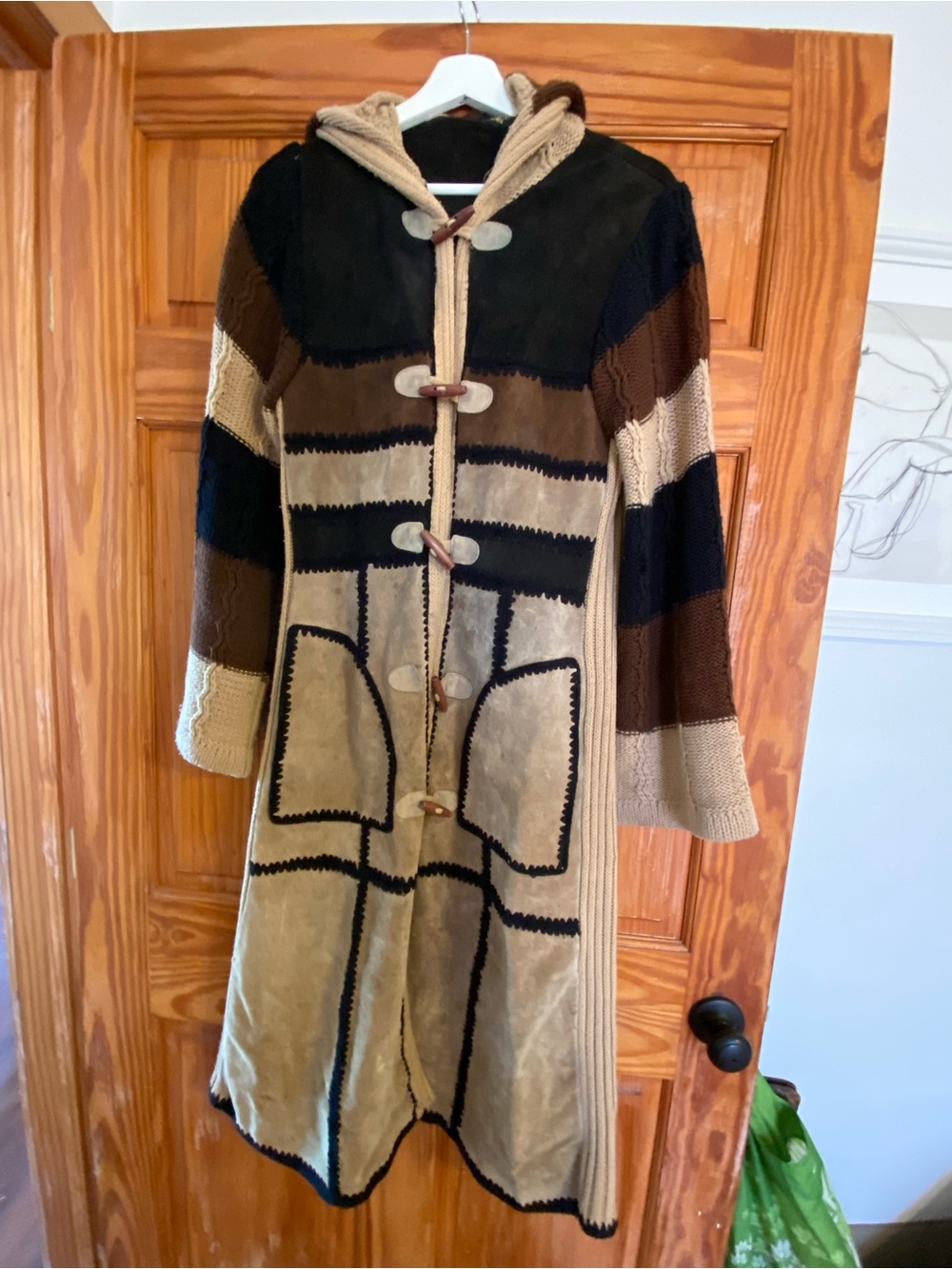 Vintage suede patched knee length coat.